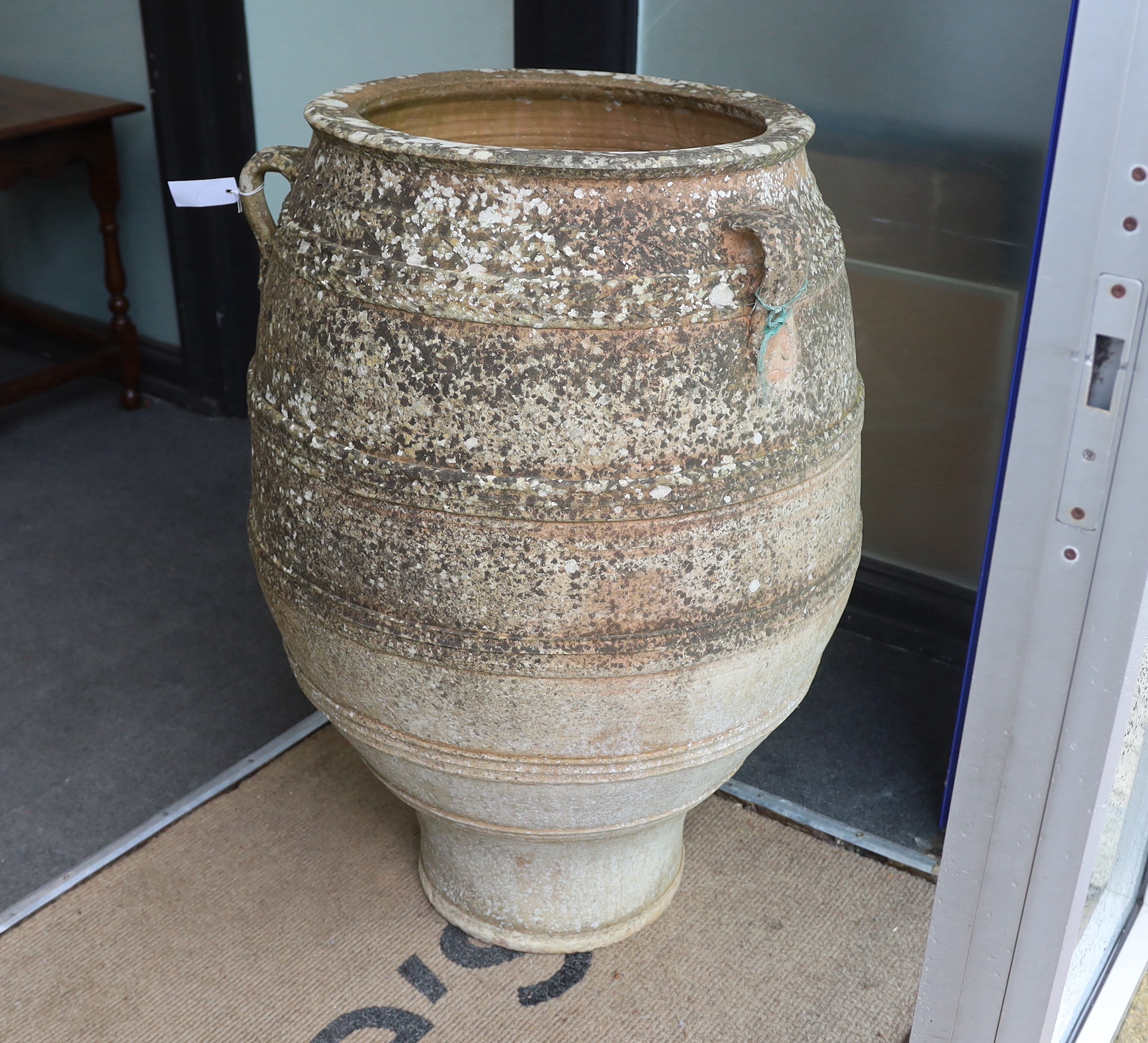 A Greek earthenware oil jar, height 100cm